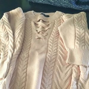 Women’s long sleeved peach pullover sweater